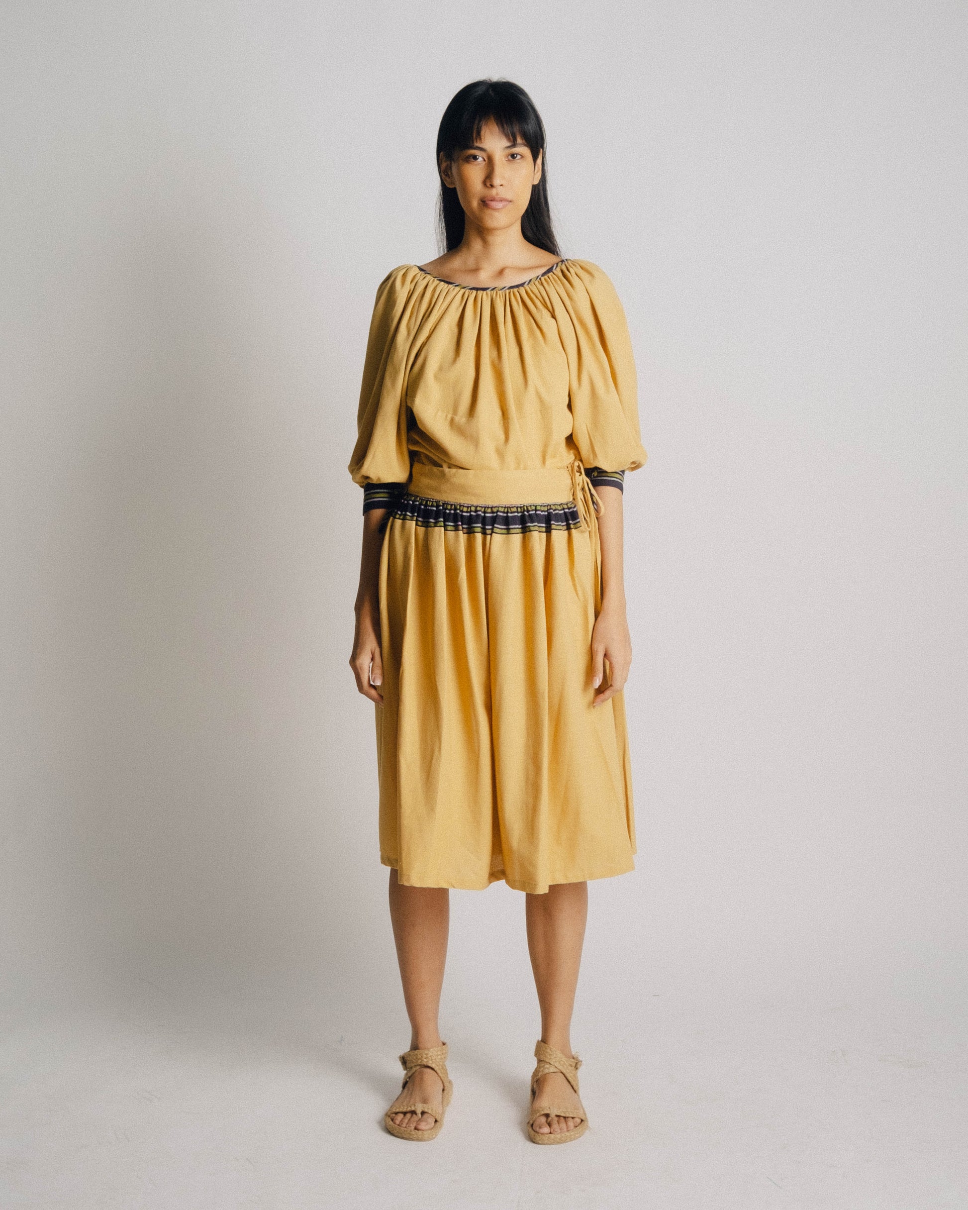 The Ara Top draws inspiration from Matisse and Yves Saint Laurent's interpretation of a Romanian peasant blouse.