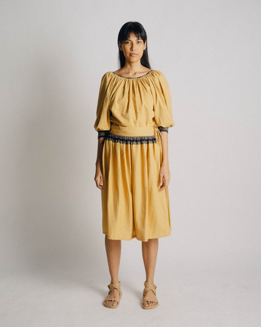 The Ara Top draws inspiration from Matisse and Yves Saint Laurent's interpretation of a Romanian peasant blouse.