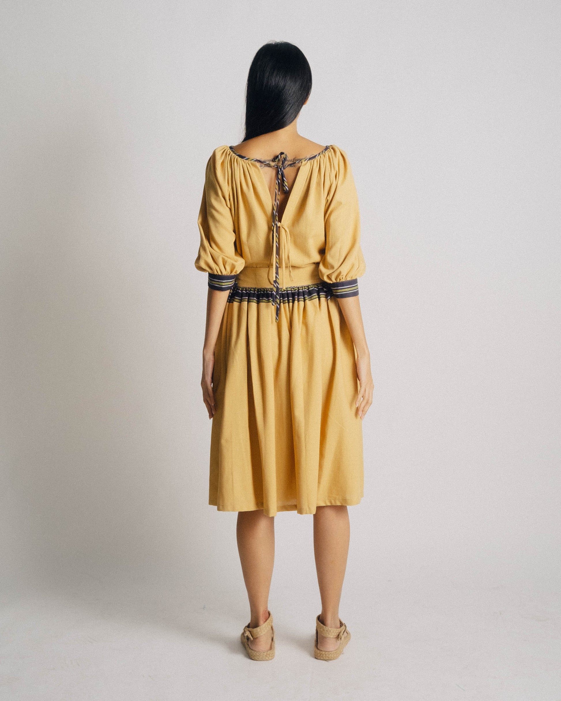 The Ara Top draws inspiration from Matisse and Yves Saint Laurent's interpretation of a Romanian peasant blouse.